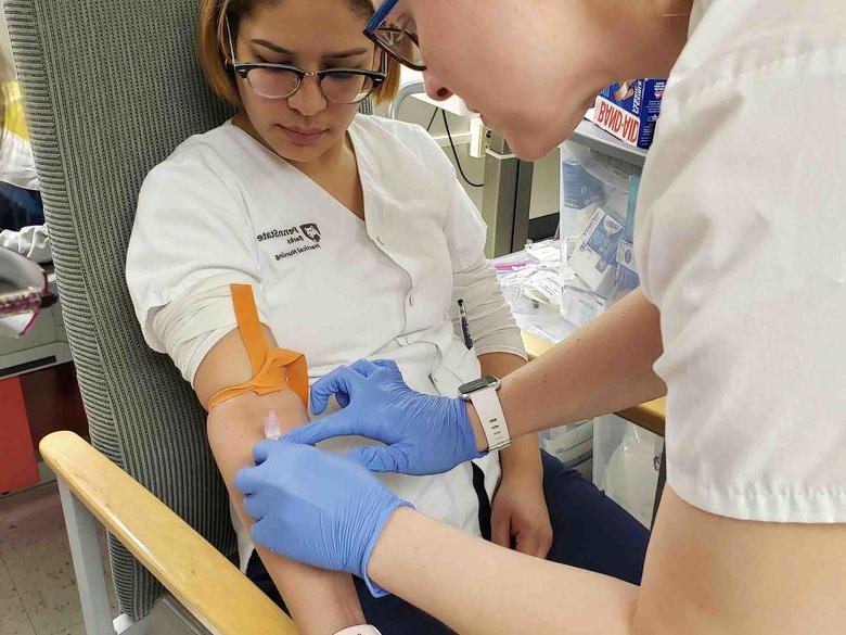 Photo of Berks Practical Nursing Students in Clinical Simulation Lab Setting